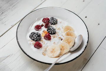 Muesli breakfast banana raspberry blackberry
