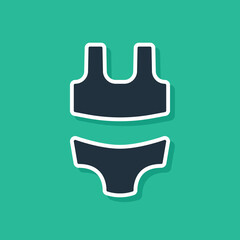 Blue Summer beach swimsuit icon isolated on green background. Beach women fashion. Vector