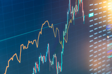 Analysis of stock quotes on the monitor. Graph of exchange rate of currencies or stock index on a...