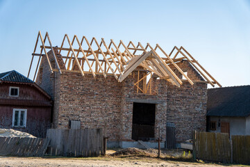 Wooden roof structure, home construction. Standard timber framed building with closed back to back...