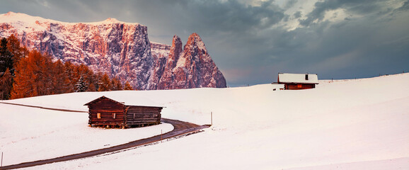 amazing winter landscape at sunrise in Alpe di Siusi. Dolomites  Italy - winter holidays destination