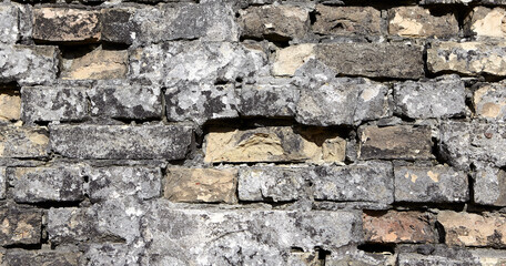Weathered painted old brick wall background. Brickwork paint.