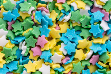 Colorful Sugar Star Sprinkles Background.