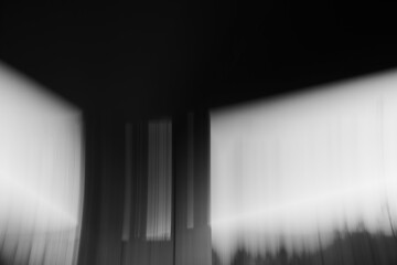 Schwarz und Weiß experimentelle Darstellung einer Brücke mit Licht und Schatten, Diagonalen, horizontalen und vertikalen Elementen und feinen Linien