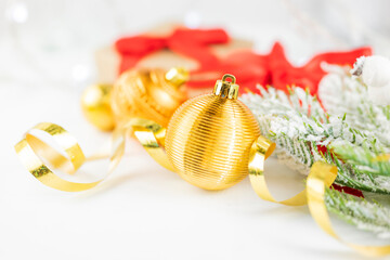 beautiful background postcard with Christmas balls ornament decorations on the snow on a Christmas tree for Christmas winter on a bokeh background