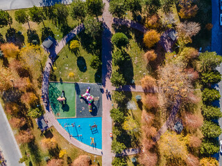 Top down aerial view of a playground for children in a public park