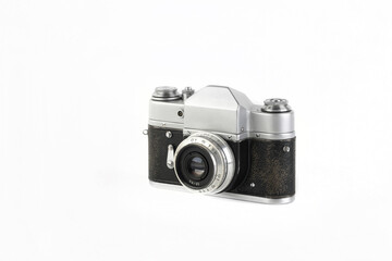 Fototapeta premium Very rare old 35 mm SLR film camera on white background.
