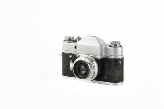 Very rare old 35 mm SLR film camera on white background.