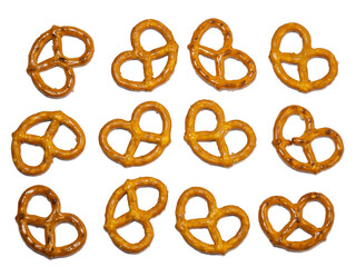 Pretzels with salt on a white background. Flour products. Baking for tea.
