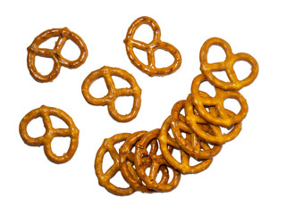 Pretzels with salt on a white background. Flour products. Baking for tea.