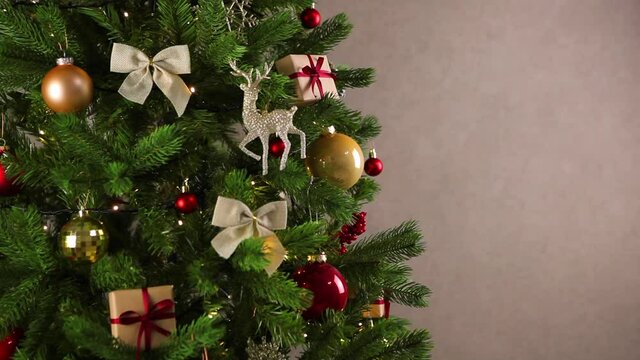 Beautiful christmas background with decorated tree and garland