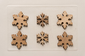 christmas decorations arranged on old art paper