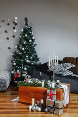 Traditional New Year's decoration of the house candles the atmosphere of comfort
