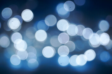 White blurred holiday lights. New Year's garland. Defocus.