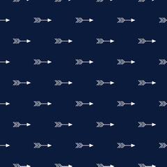 Geometric nordic seamless pattern background with repetitive crossed arrows on blue backdrop for Christmas theme designs.vector illustration 