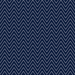 Christmas chevron pattern. Abstract background with white zig-zag stripes on a blue background. Vector illustration