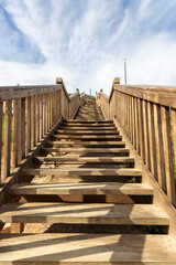 Naklejka premium looking up the stairs at the iconic boardwalk at southport port noarlunga south australia on 14th September 2021