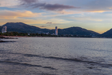 Fototapeta na wymiar Panoramic View of Patong Beach with the vibrant multi colours of the sunset Phuket Thailand 