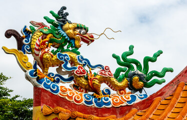 Decorative dragon sculpture at Buddhist temple in Thailand