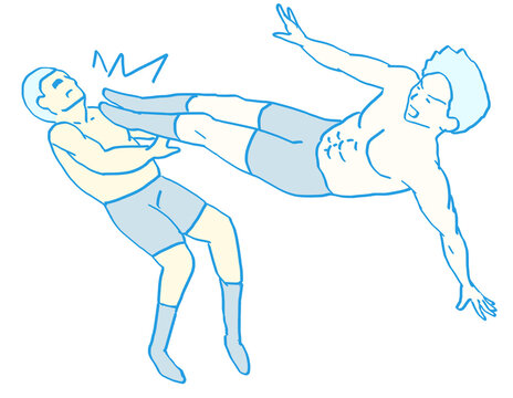 ドロップキックを決める男性