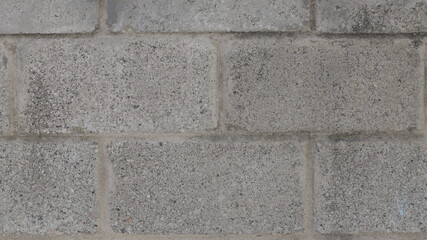 Pared de bloque de hormigón de fondo y textura sin fisuras