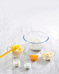 Baking Ingredients and Tools on Trendy bright Marble Background