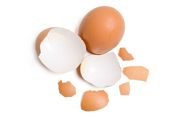 Top view group of broken eggshells stacked on white background.