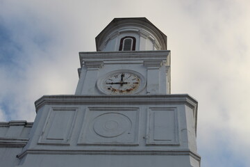 Fototapeta na wymiar The tall white tower with the clock at the blenduk church, semarang