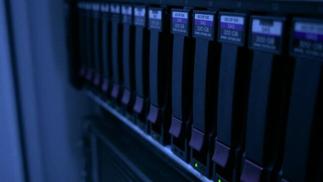 Storage Server in Modern Data Center. Rows of hard drives. Concept 3