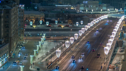 Moscow for the new year is decorated with garlands and lights, bridge