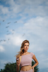 Fototapeta premium A portrait of blonde woman with ice cream
