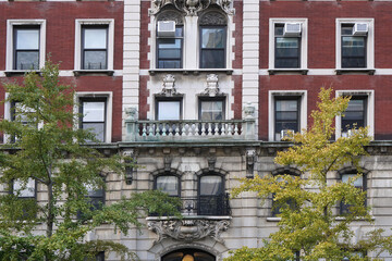 Old fashioned Manhattan apartment building facade with baroque architectural details