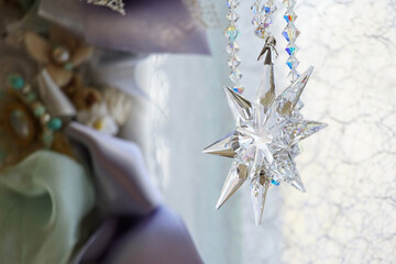 Crystal ornaments hanging in the window of the room