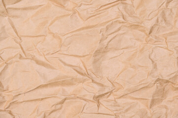 Fototapeta premium Brown crumpled paper texture background,be crush paper for creased and wrinkled for texture backdrop from shockproof paper