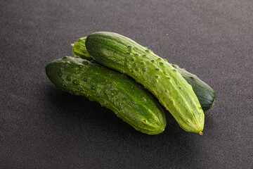 Fersh juicy green cucumbers heap