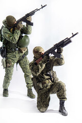 Members of the special purpose unit. Two Russian special forces soldiers with AK assault rifles in...