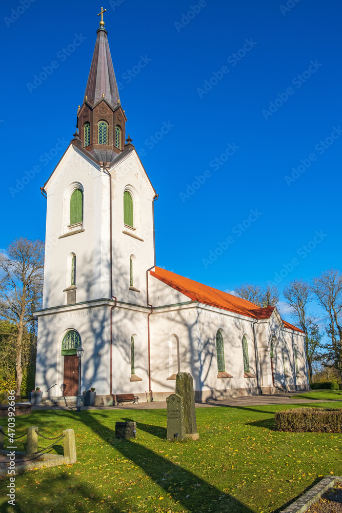 Wall mural Swedish church and a the cemetery