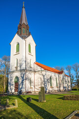 Fototapeta na wymiar Swedish church and a the cemetery