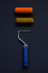 old painting tools on blue background