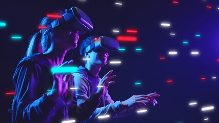 Metaverse VR virtual reality game playing, man and woman play metaverse virtual digital technology...