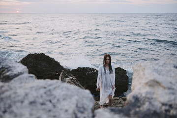 woman traveler walks volcanic rock formations on the island nature unaltered