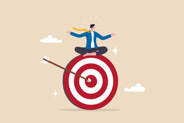 Stay focused and concentrate on business objective, goal or target, relax meditation to eliminate distraction concept, peaceful businessman meditate sitting and focusing on big archer target.