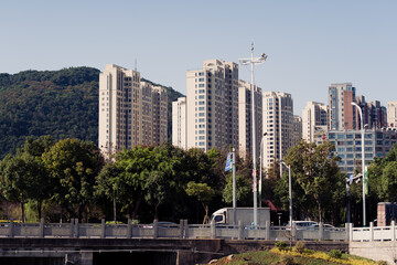 Buildings with a hill in the background
