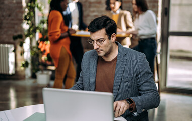Obraz premium Cinematic image of employers working in a start up business