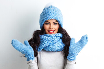 Happy surprised winter woman