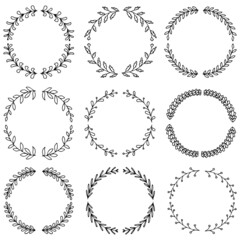 Vector illustration of hand drawn wreaths. Cute doodle floral wreath frame set.