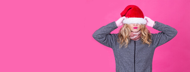 isolated woman wearing christmas santa claus hat overwhelmed and stressed - Powered by Adobe