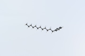 Dodecylbenzene molecule, isolated molecular model. 3D rendering