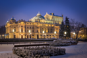 Fototapeta na wymiar Slowackiego Theater in Krakow, Poland, snowy winter night