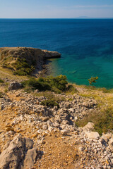 The rugged coastline north of Stara Baska in the south of Krk Island, in the Primorje-Gorski Kotar County of western Croatia in late summer
